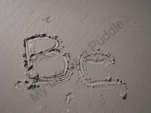 "Be" written in the sand