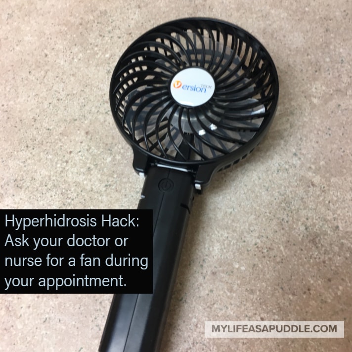 a handheld fan helps you cope with hyperhidrosis