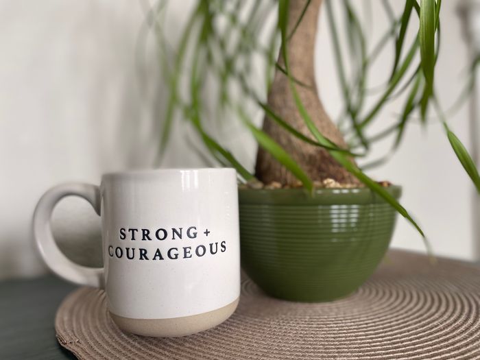 coffee mug and plant